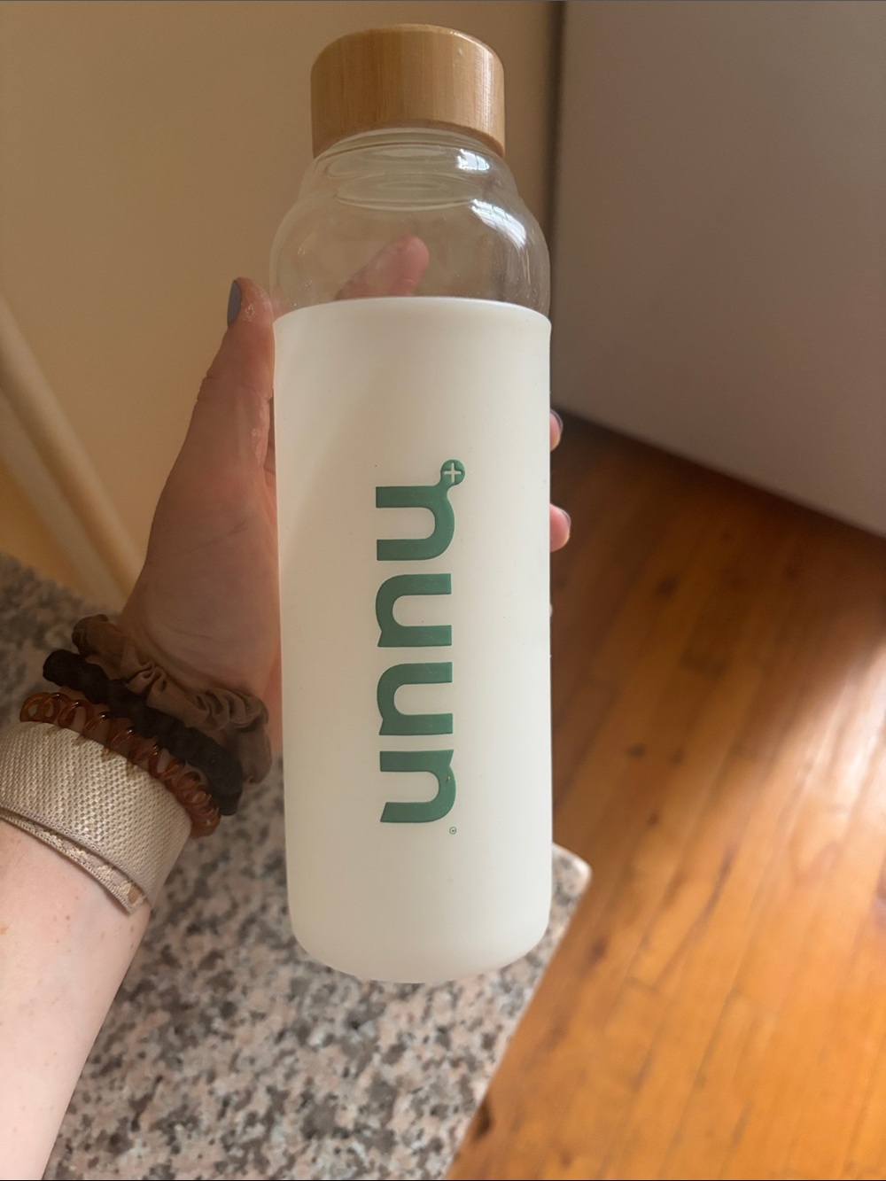 White Glass Water Bottle with Bamboo Lid and Green Logo